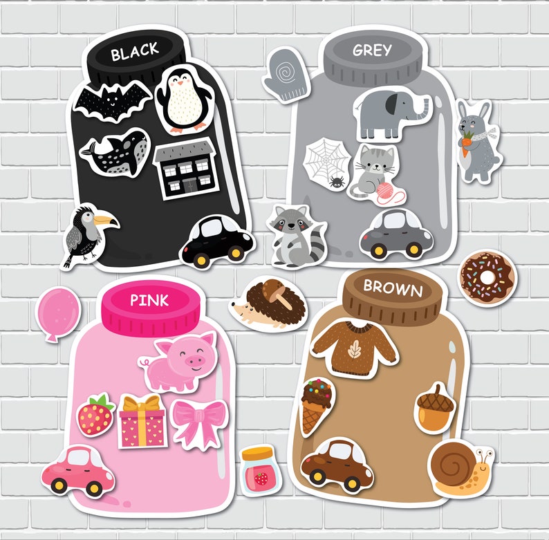 May include: Four jars with different colored lids and various images inside. The jars are labeled "Black", "Grey", "Pink", and "Brown".