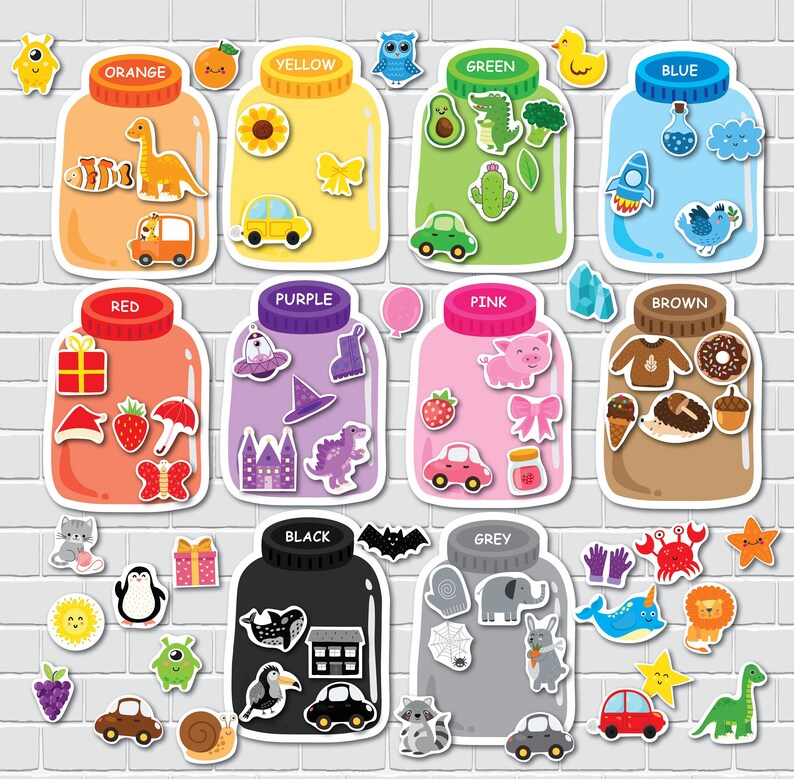 May include: A set of ten colorful jars with lids, each containing different objects. The jars are labeled with the colors: orange, yellow, green, blue, red, purple, pink, brown, black, and grey. The objects inside the jars are various colors and shapes, including a dinosaur, a car, a sunflower, a cactus, a rocket, a hat, a pig, a donut, a house, and an elephant.