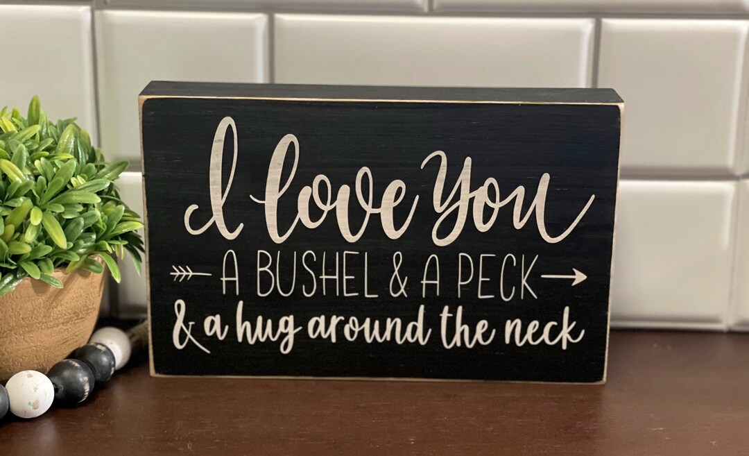Te amo un bushel y un beso y un abrazo alrededor del signo del Etsy