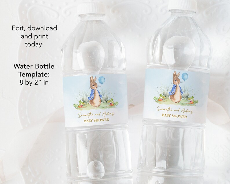 May include: Two clear plastic water bottles with labels featuring a watercolour illustration of a bunny in a blue jacket holding a blue balloon. The labels also include the text "Samantha and Aiden's Baby Shower".