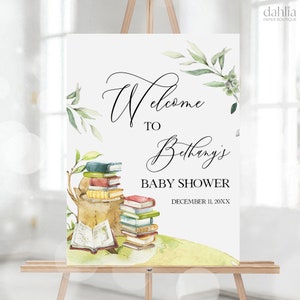 May include: Welcome to Bethany's Baby Shower sign with a watercolor illustration of a stack of books and greenery. The text reads "Welcome to Bethany's Baby Shower December 11, 20XX".