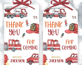May include: Two red and white thank you tags with a fire engine theme. The tags feature a red fire engine, a fireman's hat, a fire hydrant, and the text "Thank You for Coming" and "With Love, Jackson".