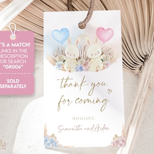 May include: A white thank you tag with gold lettering that says "thank you for coming" with a small heart symbol.  The tag features two watercolor bunnies with pink and blue balloons.  The text "with love, Samantha and Aiden" is at the bottom of the tag.  The tag is pink on the back with the text "It's a match! Links in the description or search "GR006" Sold separately."