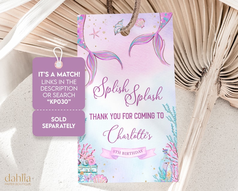 May include: Purple and blue mermaid tail thank you tag with the text "Splish Splash Thank You for Coming to Charlotte's 5th Birthday".