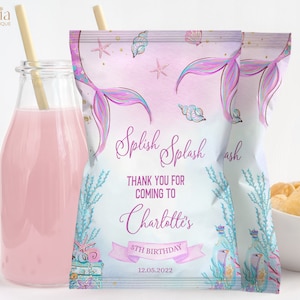 May include: A pink and blue mermaid-themed party favour bag with the text "Splish Splash Thank You for Coming to Charlotte's 5th Birthday 12.05.2022".