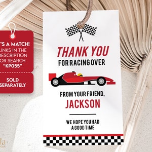 May include: A white thank you tag with a red race car and checkered flags. The text reads "Thank you for racing over from your friend, Jackson. We hope you had a good time."
