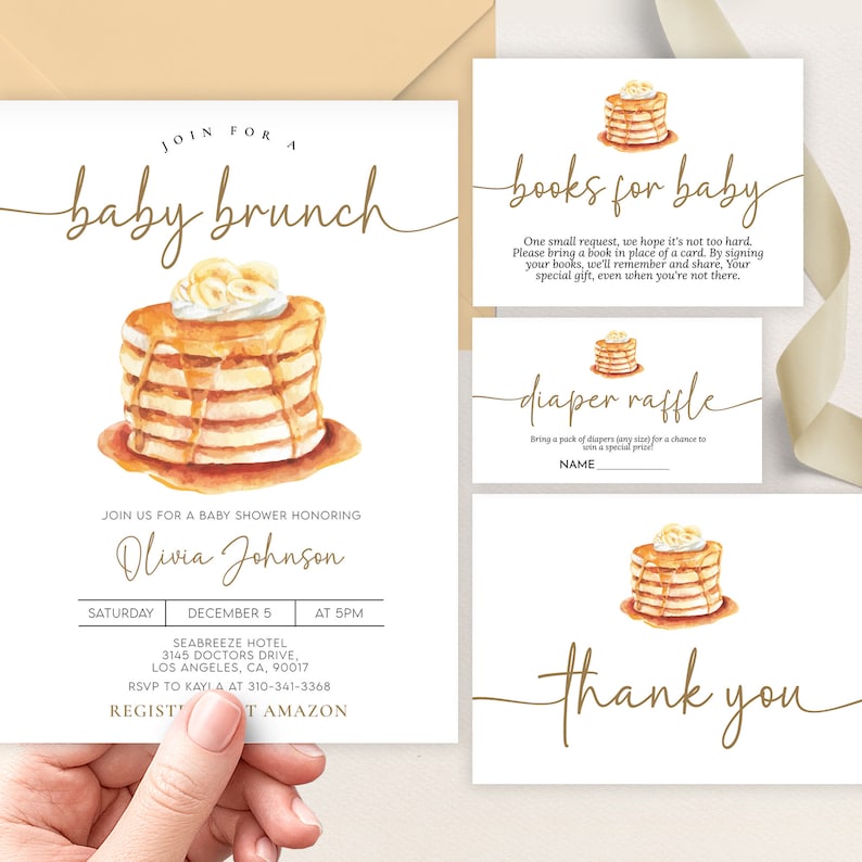May include: A baby shower invitation with a watercolor illustration of a stack of pancakes with syrup and whipped cream. The invitation says "Join for a baby brunch" and includes the name "Olivia Johnson", the date, time, and location of the event. The invitation also includes a request for guests to bring a book in place of a card, and a diaper raffle.