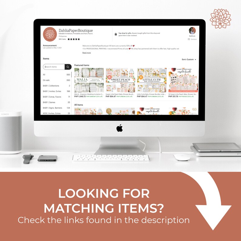 May include: A computer screen displaying a website for a paper boutique. The website features a variety of baby shower invitations and decorations, including a peach and pink themed invitation with the text "Sweet Peach Baby Shower Bundle". The website also features a section for "Featured Items" and "All Items".