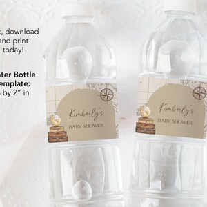 May include: Two clear plastic water bottles with brown paper labels. The labels have a map design with a compass and a globe. The text on the labels reads "Kimberly's Baby Shower".