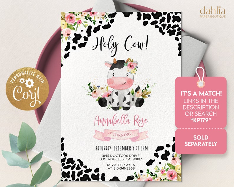 May include: A printable invitation for a 2nd birthday party with a cow theme. The invitation features a cartoon cow with pink flowers in its hair, a pink banner that says "Annabella Rose is turning 2", and a black and white cow print background. The text "Holy Cow!" is at the top of the invitation.