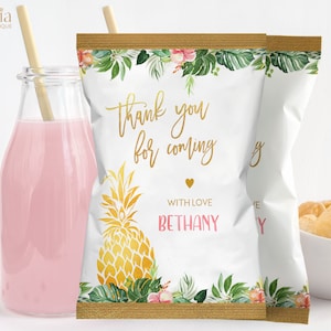 May include: White chip bag with a tropical floral design and gold accents. The bag has a thank you message that reads "Thank you for coming" with the name "Bethany" and the words "With Love".
