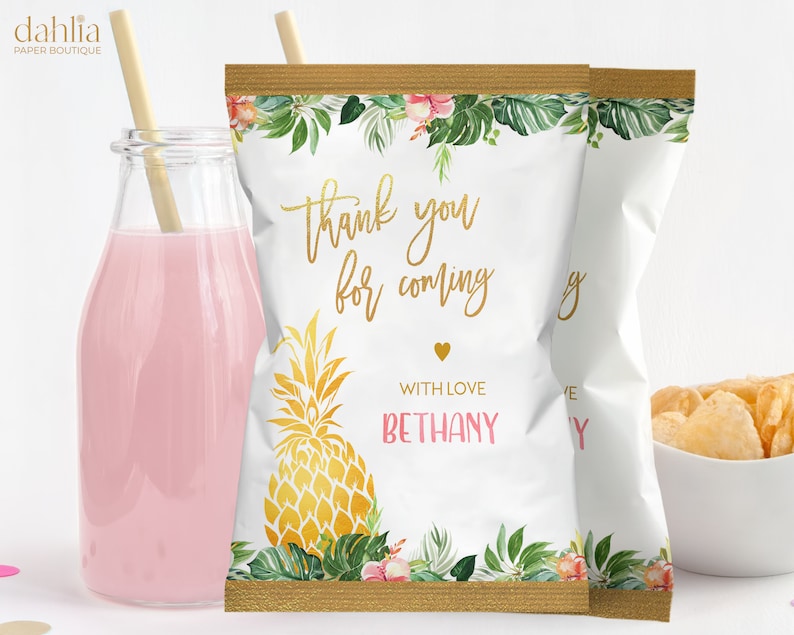 May include: White chip bag with a tropical floral design and gold accents. The bag has a thank you message that reads "Thank you for coming" with the name "Bethany" and the words "With Love".