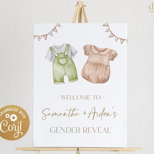 May include: A gender reveal sign with a white background and a gold border. The sign features two watercolor illustrations of baby clothes, one green and one pink, with the text "Welcome to Samantha + Aiden's Gender Reveal".