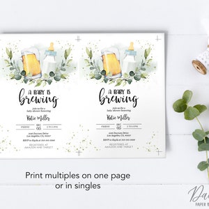 May include: A baby shower invitation with a watercolor illustration of a beer mug and a baby bottle. The text reads "A Baby is Brewing" and includes the date, time, and location of the event. The invitation is decorated with green leaves and gold glitter.