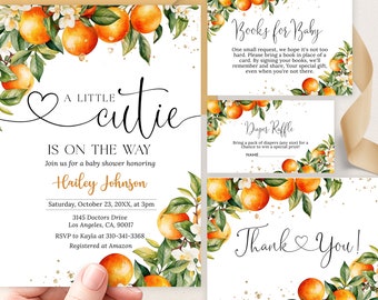 May include: Orange blossom baby shower invitation with a watercolor illustration of orange branches and leaves. The invitation includes the text "A Little Cutie Is On The Way" and details for the shower, including the date, time, location, and RSVP information. There are also cards for "Books for Baby" and "Diaper Raffle".