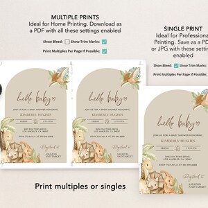 May include: Baby shower invitations with a dinosaur theme. The invitations feature a beige arch design with watercolor illustrations of dinosaurs and tropical plants. The text "hello baby" is written in a script font.