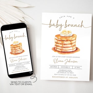May include: A baby shower invitation with a watercolor illustration of a stack of pancakes with banana slices and syrup. The invitation is for a baby brunch and includes the name Olivia Johnson, the date and time of the event, the location, and RSVP information. The text "Registered at Amazon" is also included.