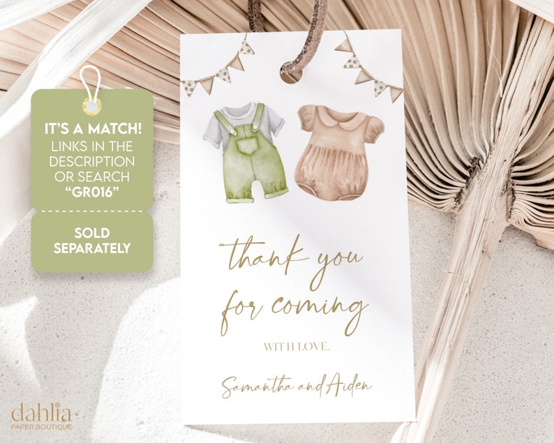 Może przedstawiać: Kartka z podziękowaniem na baby shower z akwarelową ilustracją ubranek dla dziecka w kolorze zielonym i brązowym. Tekst brzmi "It's a match! Links in the description or search "GRO16" Sold separately. Thank you for coming. With love, Samantha and Aiden."