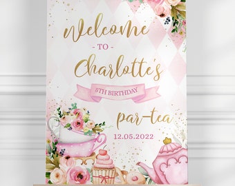 May include: Pink and gold welcome sign for a 5th birthday party. The sign says "Welcome to Charlotte's 5th Birthday par-tea 12.05.2022". The sign features a pink teapot, teacups, and cupcakes.