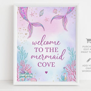 May include: A printable sign with a watercolor background featuring two mermaid tails, seashells, and stars. The text reads "Welcome to the Mermaid Cove".