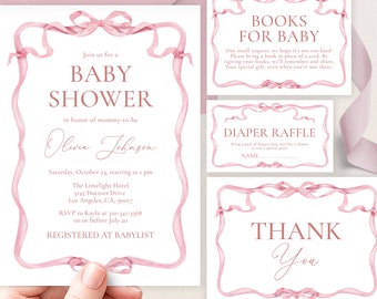May include: Pink and white baby shower invitation with a pink ribbon border. The invitation includes the text "Join us for a Baby Shower in honor of mommy-to-be Olivia Johnson". The invitation also includes the date, time, location, and RSVP information. There are also three additional cards with pink ribbon borders. The first card says "Books for Baby" and includes a request to bring a book in place of a card. The second card says "Diaper Raffle" and includes a space to write a name. The third card says "Thank You".