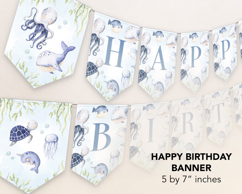Peut inclure: Une banni&egrave;re en aquarelle bleue et blanche avec les mots "JOYEUX ANNIVERSAIRE" et "BANNI&Egrave;RE" en texte blanc. La banni&egrave;re pr&eacute;sente diverses cr&eacute;atures marines, notamment une pieuvre, une baleine, une tortue, une m&eacute;duse et une narval. La banni&egrave;re mesure 12,7 cm par 17,8 cm.