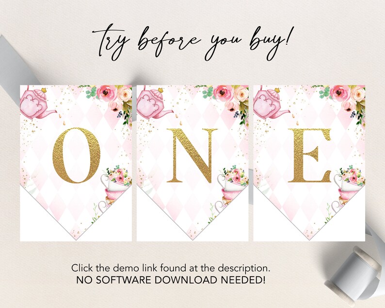 May include: A printable banner with the word "ONE" in gold letters on a pink and white background with floral and teacup designs. The text "Try before you buy!" is at the top of the image. The text "Click the demo link found at the description. NO SOFTWARE DOWNLOAD NEEDED!" is at the bottom of the image.