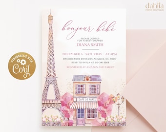 May include: A pink and white baby shower invitation with a watercolor illustration of the Eiffel Tower, a Parisian cafe, and pink flowers. The text on the invitation reads "bonjour bibi" and includes details for the event, including the date, time, location, and RSVP information. The invitation also states that the guest of honor is registered at Amazon and Target.