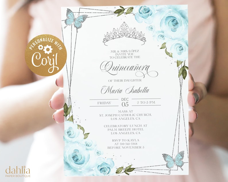 May include: A Quincea&ntilde;era invitation with a silver glitter background and a silver geometric frame. The invitation features blue watercolour roses, butterflies, and a silver crown. The text reads "MR & MRS LOPEZ INVITE YOU TO CELEBRATE THE QUINCEA&Ntilde;ERA OF THEIR DAUGHTER MARIA ISABELLA FRIDAY DEC 05 2 TO 5 PM MASS AT ST. JOSEPH CATHOLIC CHURCH LOS ANGELES CA CELEBRATORY LUNCH AT PALM BREEZE HOTEL LOS ANGELES, CA RSVP TO KAYLA AT 310-341-3368 BEFORE NOVEMBER 3"