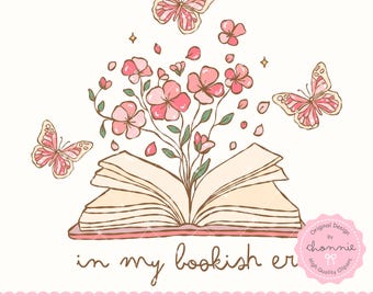 May include: An open book with pink flowers growing out of it. Butterflies are flying around the book and flowers. The text "in my bookish era" is below the book.
