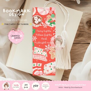 May include: A rectangular bookmark with a red background featuring illustrations of hot cocoa, gingerbread cookies, pillows, and socks. The text reads: Fairy lights, Pillow fights, And Midnight reads. It includes a white tassel at the top.