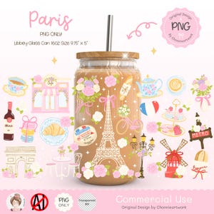 May include: A clear glass Libbey can with a wooden lid and a stainless steel straw. The can is decorated with pink and white Parisian themed illustrations, including the Eiffel Tower, flowers, and a bicycle. The can is 24.77 cm tall and 12.7 cm wide.