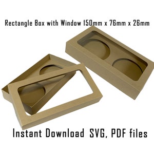 May include: Two brown cardboard boxes with rectangular windows. The boxes are 150mm x 76mm x 26mm. The text "Instant Download SVG, PDF files" is printed on the bottom of the image.