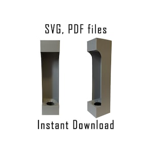 以下が含まれることがあります： 切り抜きデザインの灰色の段ボール箱が2つ。箱の上に「SVG, PDF files」というテキストがあり、箱の下に「Instant Download」というテキストがあります。