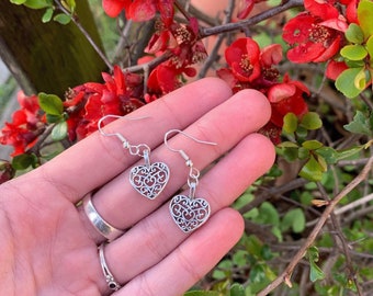 heart embellishment earrings silver