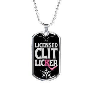May include: A black dog tag necklace with a silver chain. The tag has the text "LICENSED CLIT LICKER" in white with a pink tongue graphic.
