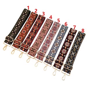 May include: Eight different patterned woven straps with gold metal clasps. The straps are in various colors, including green, brown, red, pink, blue, and black.