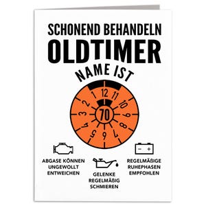 May include: A white card with black text that reads "Schonend Behandeln Oldtimer Name Ist".  A red and black speedometer-like graphic with the number 70 in the center.  Below the graphic are three icons with text: "Abgase Konnen Ungewollt Entweichen", "Gelenke Regelmaessig Schmieren", and "Regelmaessige Ruhephasen Empfohlen".