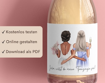 May include: A printable wedding label featuring two women, one in a white wedding dress and the other in a light blue dress. The text on the label reads "Julia, willst du meine Trauzeugin sein!" which translates to "Julia, will you be my maid of honor?"