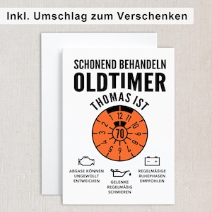 May include: A white card with black and orange text and graphics. The text reads "Schonend Behandeln Oldtimer Thomas Ist". The card has a speedometer graphic with the number 70 in the center. The card also has three icons with text below them. The text below the icons reads "Abgase Konnen Ungewollt Entweichen", "Gelenke Regelmaessig Schmieren", and "Regelmaessige Ruhephasen Empfohlen".