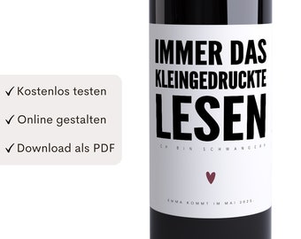 May include: A white wine bottle label with black text that reads "IMMER DAS KLEINGEDRUCKTE LESEN CHBIN SCHWANGER EMMA KOMMT IM MAI 2025." There is a small red heart below the text.