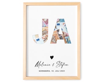 May include: A printable template for a money box, featuring the word "JA" in large letters with cut-out areas to insert money. The text "Melanie & Stefan" and "Nürnberg, 10. Juli 2023" is below the letters. The text "ZUM SELBER AUSSSCHNEIDEN" is below the image.