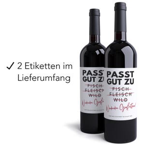 May include: Two wine bottles with white labels that say "Pass Gut Zu" with the words "Fisch", "Fleisch", and "Wild" crossed out. The labels also say "Wendenden Grobtetten!" and "Barry Muller kommt im August 2020".