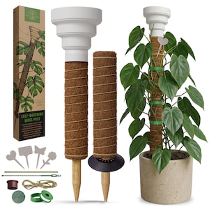 May include: A self-watering moss pole kit featuring two brown coconut fiber poles with white tiered reservoirs, a cardboard box labeled Self-Watering Moss Pole, green plant ties, twine, and four small white plant markers in various shapes.