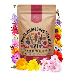 May include: A brown bag of annual wildflower seed mix with the text "Annual Wildflower Seed Mix" and "Over 100,000 Seeds Per Pack". The bag is surrounded by colorful flowers, bees, and butterflies.
