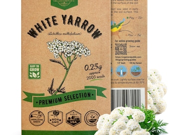 May include: A brown paper packet of White Yarrow seeds, labeled "Easy to Grow" and "Premium Selection." The packet features a botanical illustration of the plant with white flowers and green leaves. The packet also includes a QR code for online growing instructions and a label that says "Made in USA."