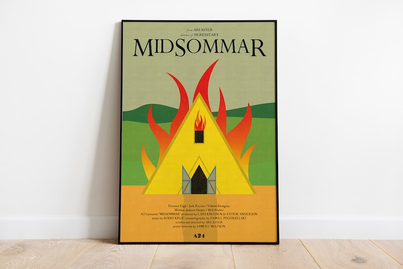 May include: A movie poster for the film "Midsommar" featuring a yellow triangular house with a red and orange flame design. The poster has a green background with a small hill in the distance. The text "from ARI ASTER director of HEREDITARY" is at the top of the poster. The text "MIDSOMMAR" is in large, bold letters at the top of the poster. The text "A24" is in the bottom right corner of the poster.