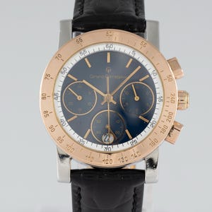 Girard Perregaux Cronografo al quarzo acciaio quadrante blu Ref: 7001 7700