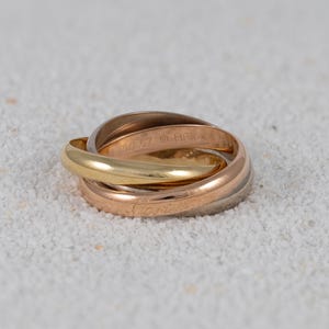 Cartier Trinity ring in 18k yellow, white, and rose gold
