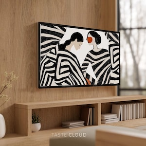 Puede incluir: Una impresión de arte abstracto en blanco y negro que presenta a dos mujeres con patrones de rayas blancas y negras. Las mujeres se miran y sus rostros están parcialmente ocultos por las rayas. El fondo es de color gris claro.